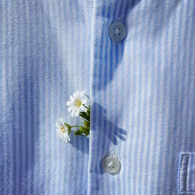 Close-up of a blue and white striped cotton shirt